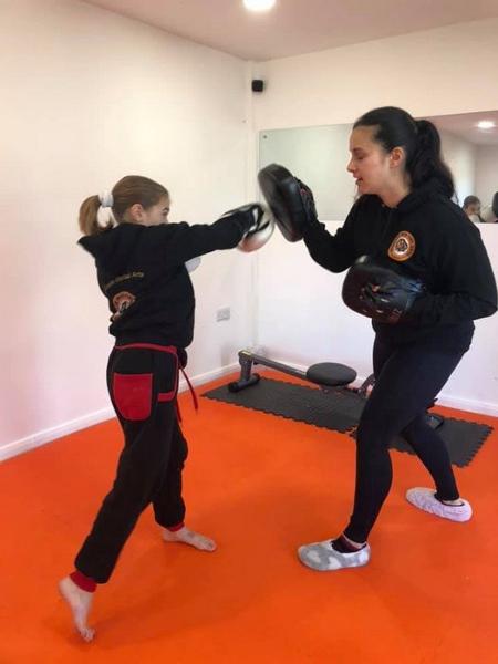 Martial arts gym Bexhill, Up-grade Martial Arts instructor Sarah.